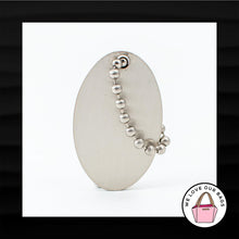 Load image into Gallery viewer, KENNETH COLE REACTION OVAL SILVER NICKEL METAL KEY FOB BAG CHARM KEYCHAIN TAG