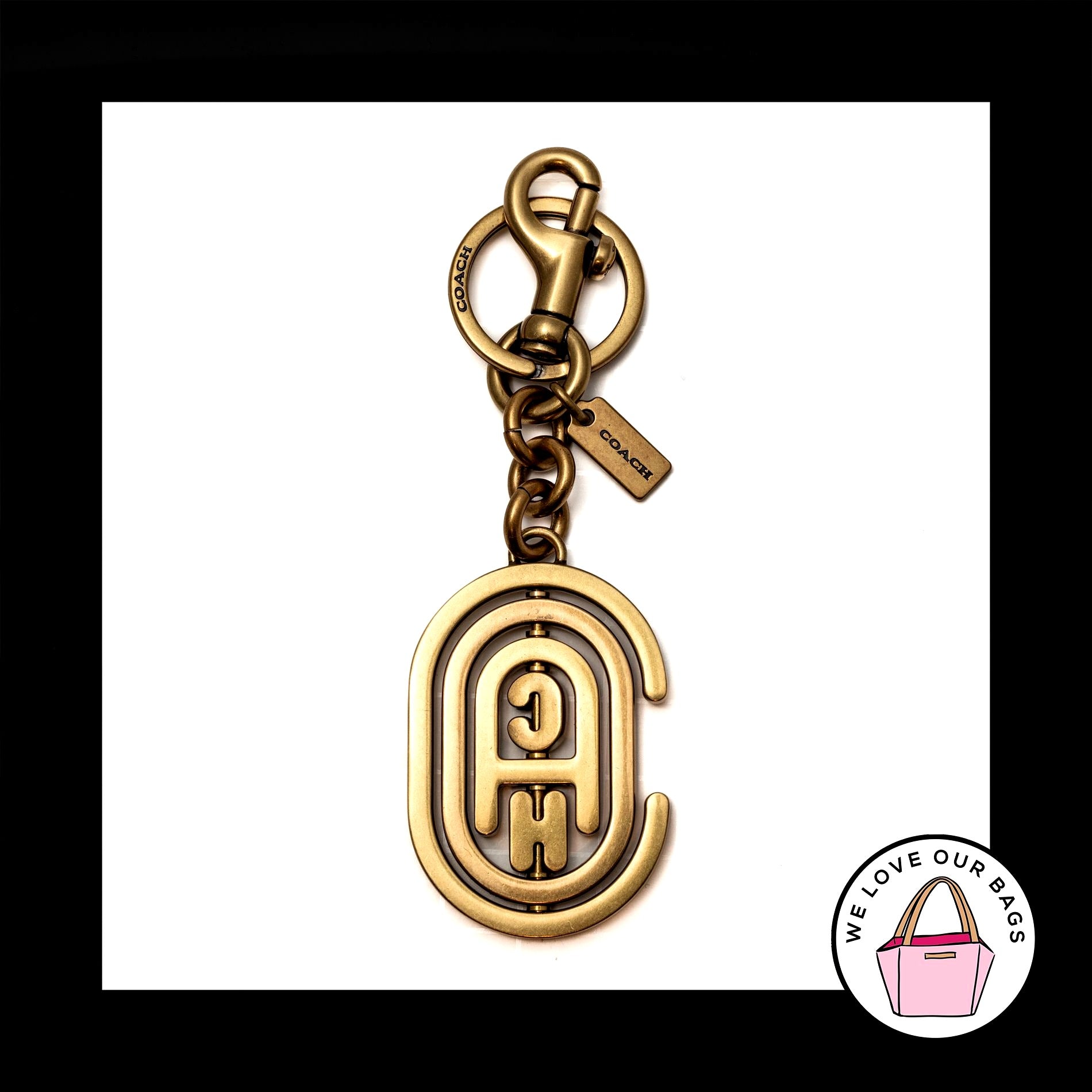 レディース coach signechar earth motif keycharm
