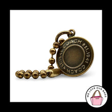 Load image into Gallery viewer, COACH 65th Anniversary Hang Tag Medallion Disc Antique Gold Brass Bag Charm Fob
