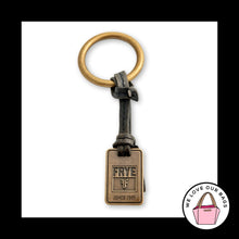 Load image into Gallery viewer, FRYE Gold Brass Metal Black Leather Strap Ring Bag Charm Hang Tag Keychain Fob
