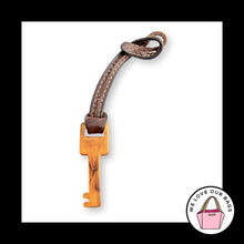 Load image into Gallery viewer, FOSSIL KEY Amber Acrylic Plastic Brown Leather Strap Bag Charm Hang Tag Fob
