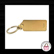 Load image into Gallery viewer, COACH 65TH ANNIVERSARY Horse Carriage Gold Brass Hang Tag Fob Bag Charm Keychain
