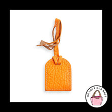 Load image into Gallery viewer, VINTAGE Y2K DOONEY &amp; BOURKE Gold Metal Orange Leather Bag Charm Hang Tag Fob
